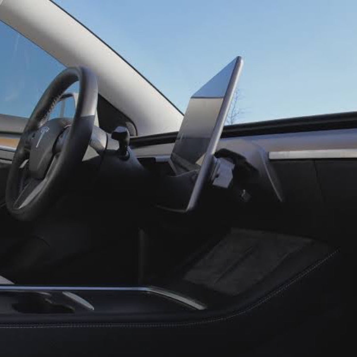 Dashboard screen angled to reduce glare in bright daylight