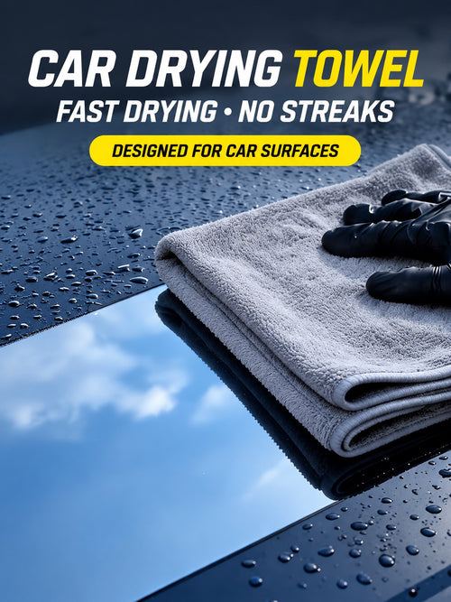 Folded drying towel on a wet car roof