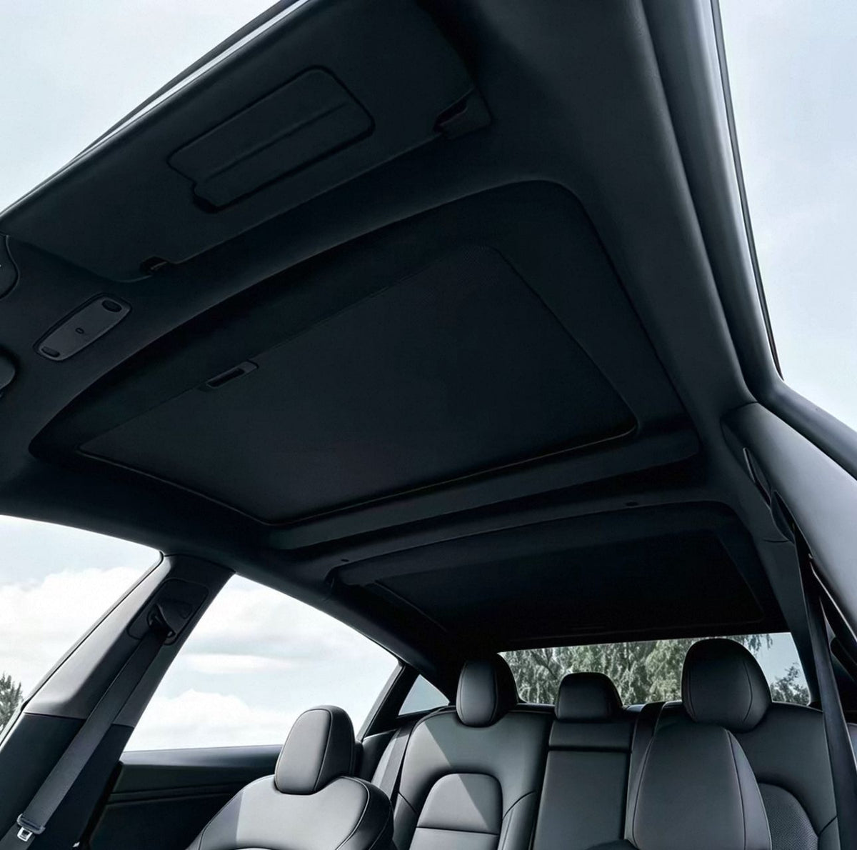 Apex SkyShade Black installed on Model 3 Highland glass roof