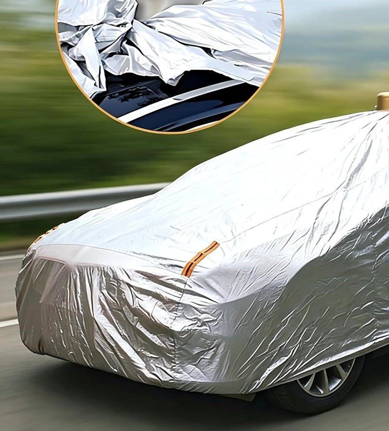 Car fully covered by the Apex AutoCover parked by a lake