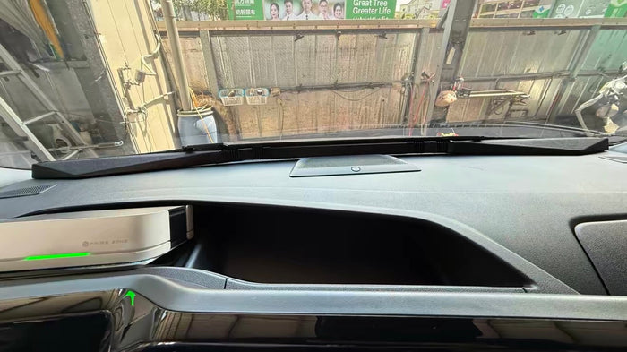 The rolled bar sitting flush on the dashboard while driving